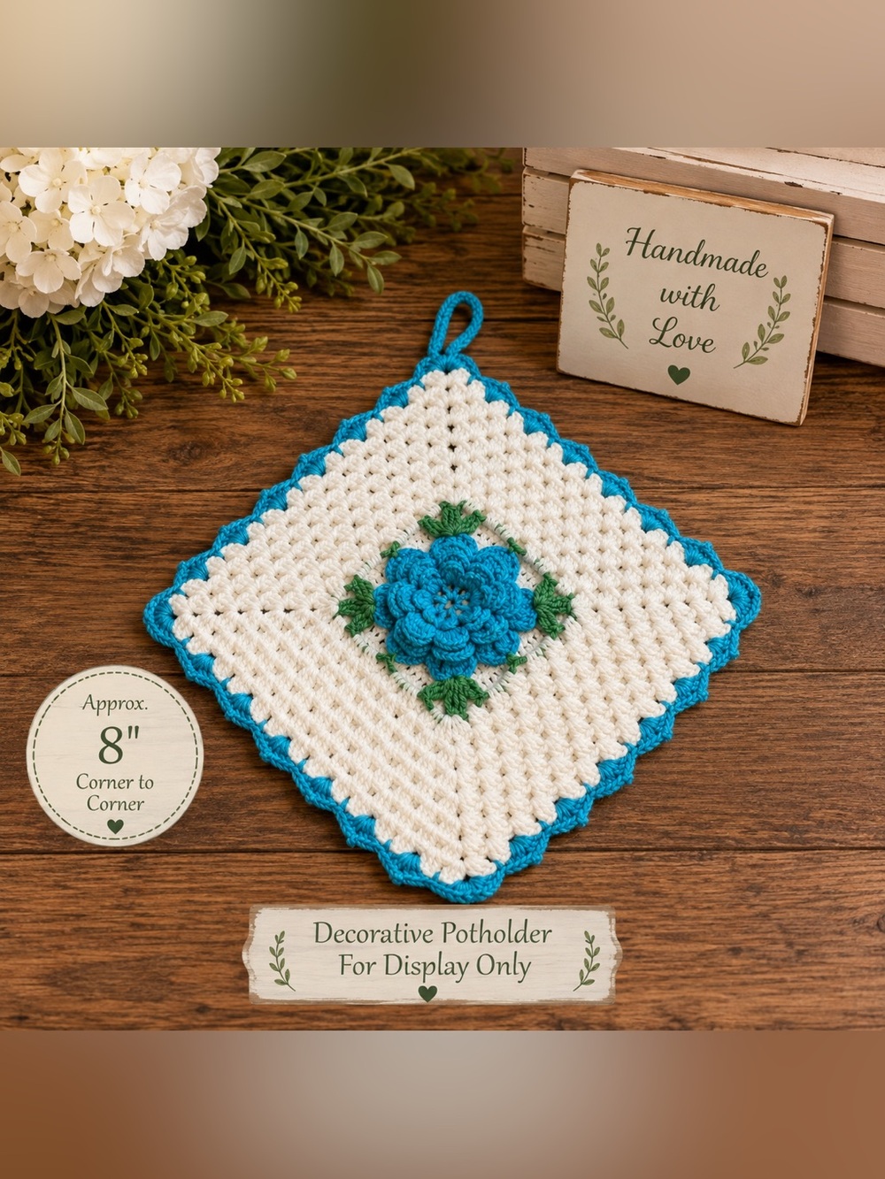 Source Unknown Blue and White Crochet Potholder with Green Leaf Accents